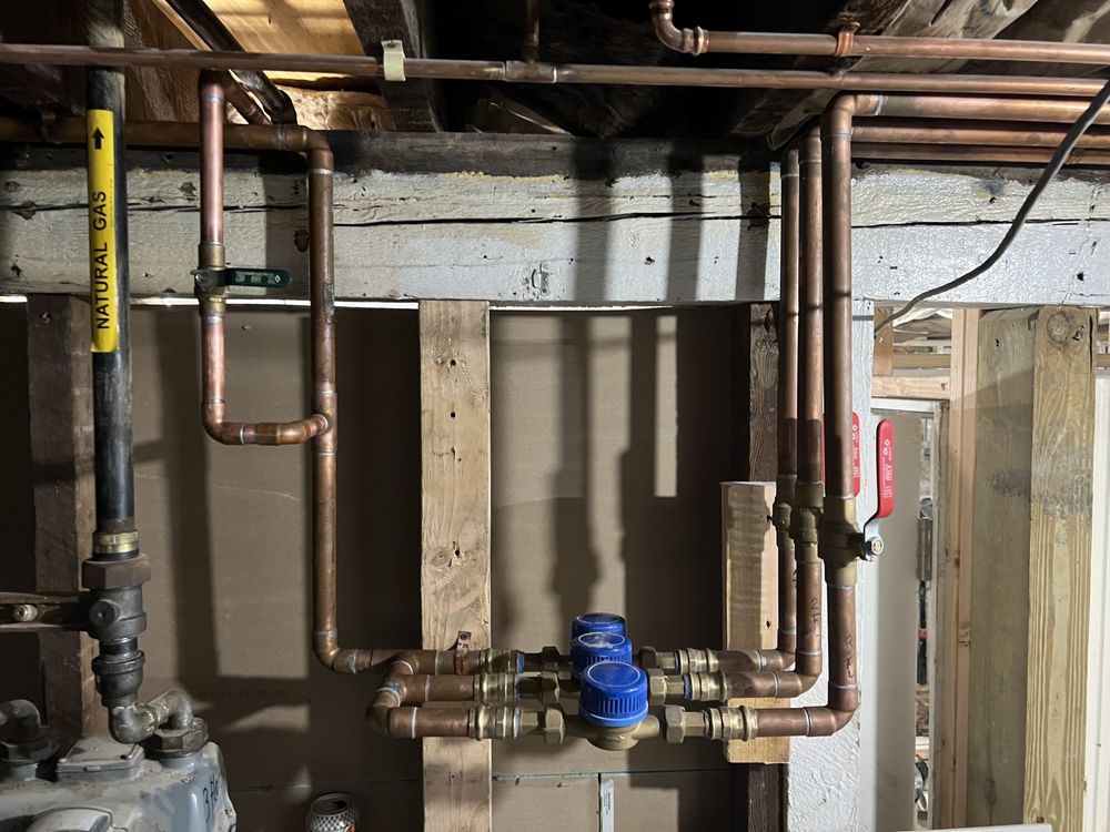 Slide of Family Drain Cleaning