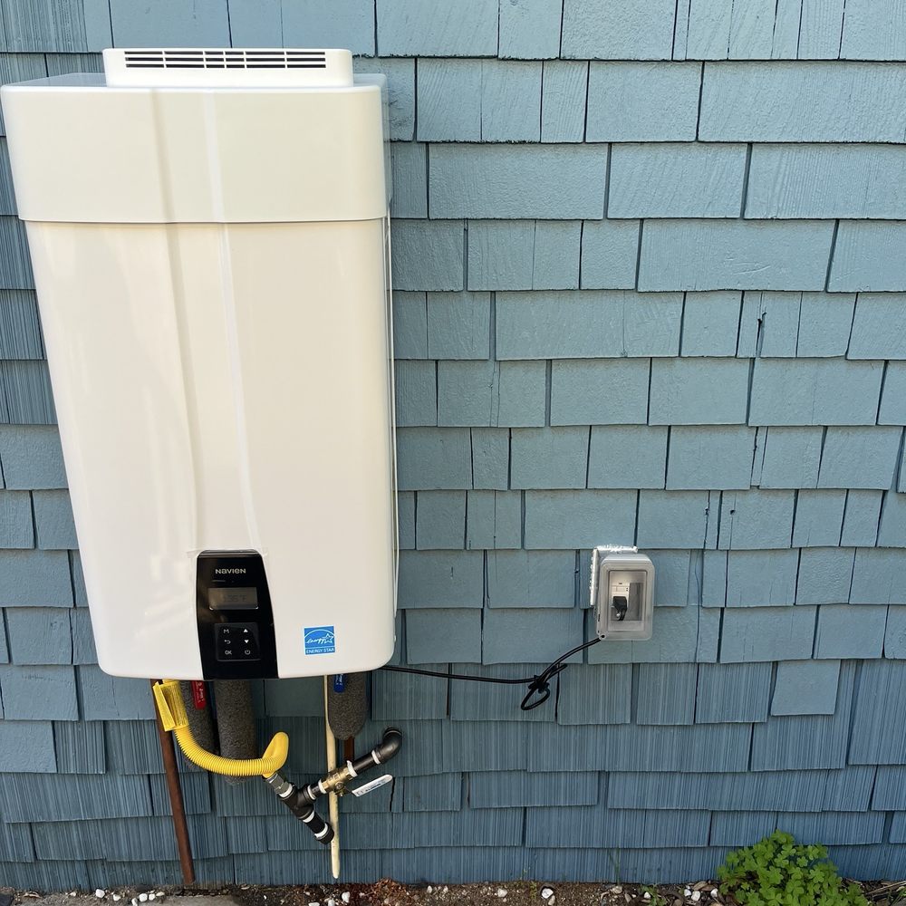 Outlets on right of tankless heater was installed in an hour and a half Outlets on right of tankless heater was installed in an hour and a half