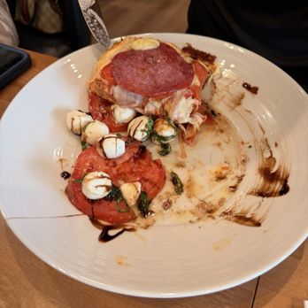 Amici Pizzeria & Bar - We had some deep dish pizza as well and we just piled it on top of the caprese lol we were having a bit of everything!! - Pizza Near Me - Reno, Nevada