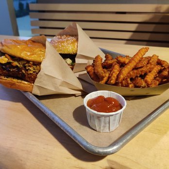 Burgers Park - Spicy Chik'n (front), Veggie Crisp (back), Sweet Potato Fries with Curry Ketchup - Burgers Near Me - North York, Ontario Burgers Park - Spicy Chik'n (front), Veggie Crisp (back), Sweet Potato Fries with Curry Ketchup - Burgers Near Me - North York, Ontario