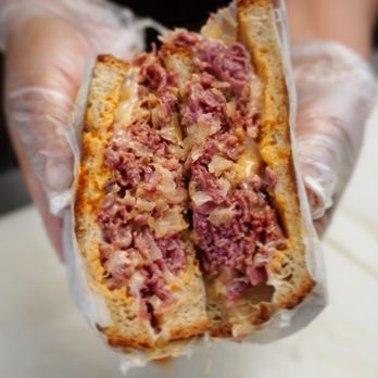 Belly Busters - a person holding a sandwich - Breakfast & Brunch Near Me - Bensalem, Pennsylvania Belly Busters - a person holding a sandwich - Breakfast & Brunch Near Me - Bensalem, Pennsylvania