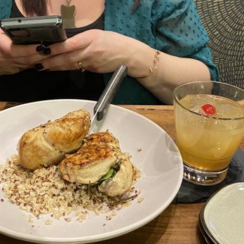 The Oasis - Chicken stuffed with goat cheese and spinach with quinoa - Bars Near Me - Goshen, Indiana The Oasis - Chicken stuffed with goat cheese and spinach with quinoa - Bars Near Me - Goshen, Indiana