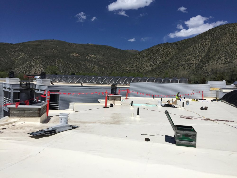 Slide of Professional Rooftop Services