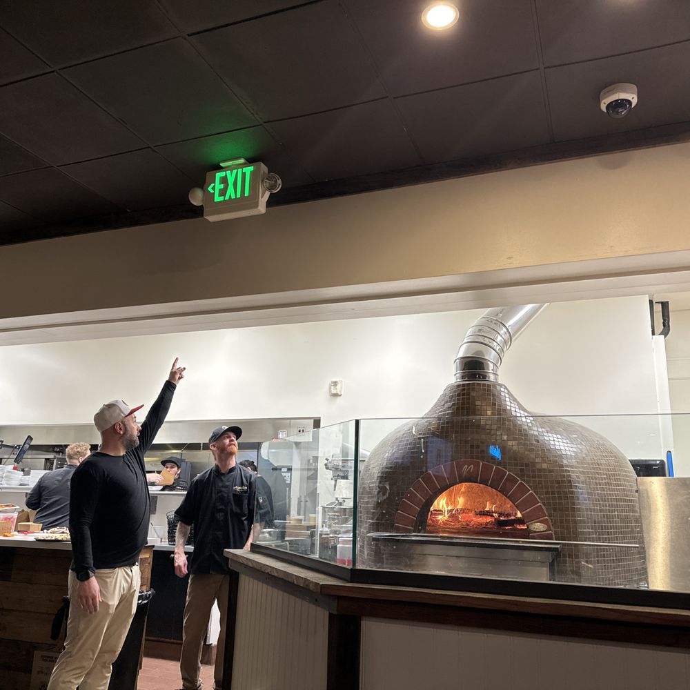 Ausiello’s Homeslice - people in a kitchen - Pizza Near Me - Santa Rosa, California Ausiello’s Homeslice - people in a kitchen - Pizza Near Me - Santa Rosa, California