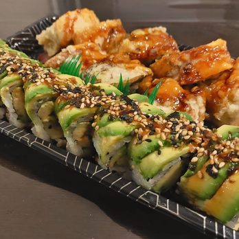 Yanagi Sushi - Caterpillar Roll - 8 pieces (bottom) Tiger Roll - 8 pieces (top) - Japanese Near Me - Toronto, Ontario