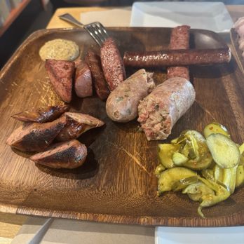 Cochon Butcher - Sausage plate along with incredible pickles! - Sandwiches Near Me - New Orleans, Louisiana