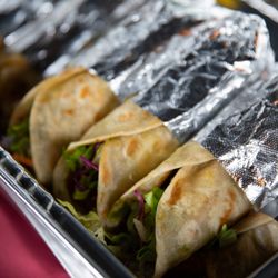 The Roll Pod Indian Restaurant - We ordered the Chicken Masala and Achaari Aloo for our group picnic. The rolls were flavorful, individually wrapped, never soggy.