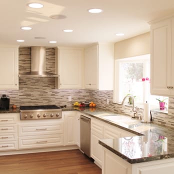 Archer Building Group - a kitchen with white cabinets and granite countertops - General Contractors Near Me - Redondo Beach, California