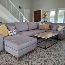 New Montecito sofa in Darby Silver fabric.