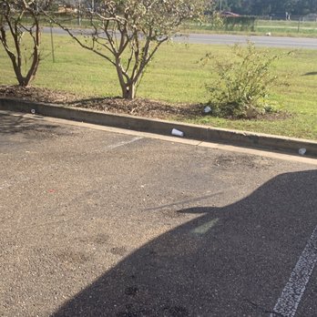 Chili's - Dirty, trash filled parking lot - Tex-Mex Near Me - Ruston, Louisiana