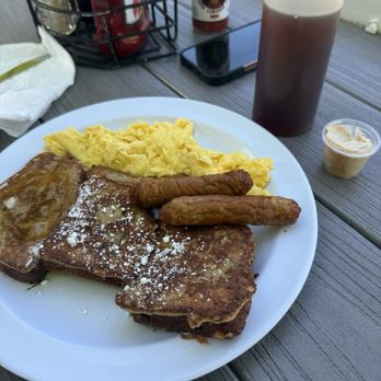 Stella's - Banana French toast with eggs and sausage - Delis Near Me - Gulfport, Florida