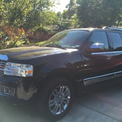 Lincoln Navigator SUV - 7 Passenger, Split folding back seat, expanded space for luggage, Bluetooth capabilities and DVD/entertainment unit