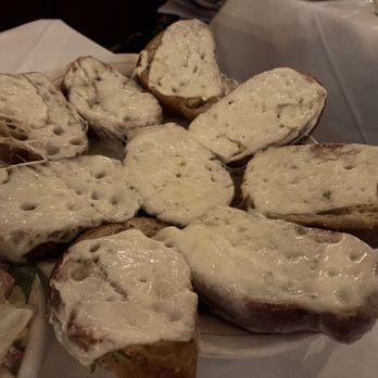Carmine's - Time Square - Regular basket of bread is complimentary. We opted to try garlic bread with cheese - Italian Near Me - New York, New York Carmine's - Time Square - Regular basket of bread is complimentary. We opted to try garlic bread with cheese - Italian Near Me - New York, New York