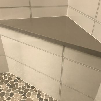 Pacgen Construction - Carl and his crew custom built this shower bench for us based on a picture from a magazine. The bench top is hand cut and finished quartz. - General Contractors Near Me - Murrieta, California