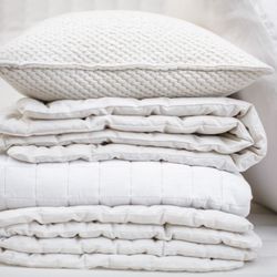 The Natural Mattress Store - Organic toppers under a Klex pillow