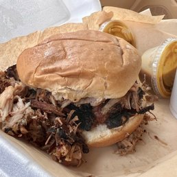 BBQ pork sandwich with mustard bbq sauce.