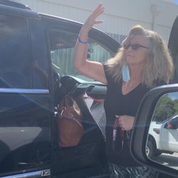 Chuck's Guns & Ammo - Here she's waving this employee down ...he proceeds to back up behind my vehicle.
