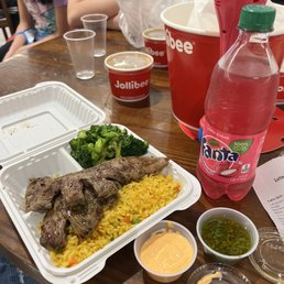 a tray of food and drinks on a table a tray of food and drinks on a table