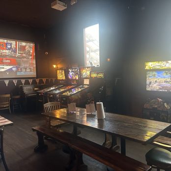 Jules Maes Saloon - Game room with big screen and vissoep games - Comfort Food Near Me - Seattle, Washington