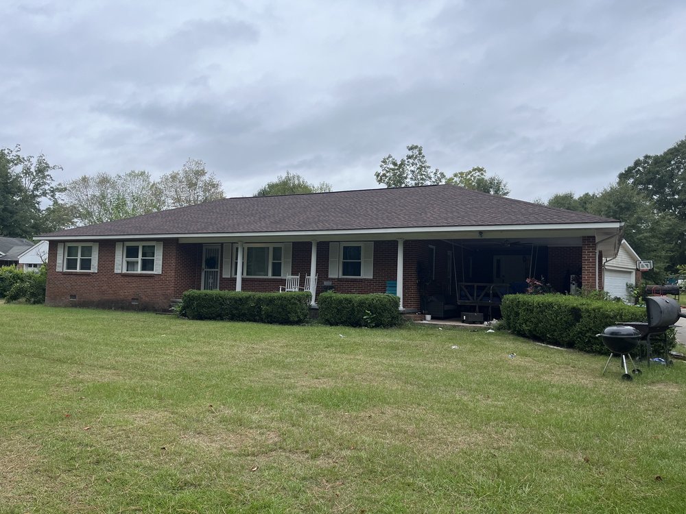 Slide of Rock Creek Roofing