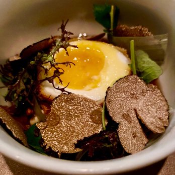 Sepia - crispy soft boiled egg, celery root porridge, black truffle consommé and added black truffle shavings - New American Near Me - Chicago, Illinois Sepia - crispy soft boiled egg, celery root porridge, black truffle consommé and added black truffle shavings - New American Near Me - Chicago, Illinois