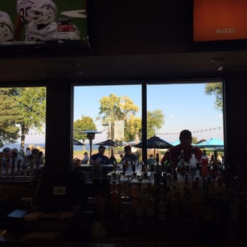 TJ's Harbor Restaurant - View of lake Winnebago from inside the bar. - New American Near Me - Oshkosh, Wisconsin TJ's Harbor Restaurant - View of lake Winnebago from inside the bar. - New American Near Me - Oshkosh, Wisconsin