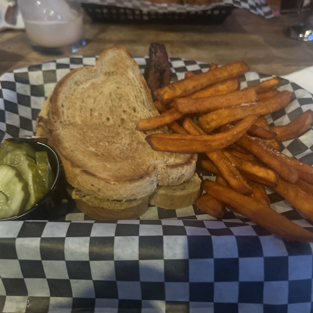 The Lincoln Pub And Grub - Pastrami sandwich with a side of sweet potato fries - Beer Bar Near Me - Clovis, California The Lincoln Pub And Grub - Pastrami sandwich with a side of sweet potato fries - Beer Bar Near Me - Clovis, California