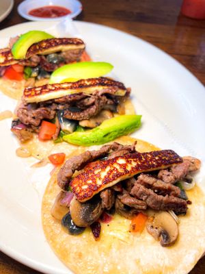 Photo of La Botana Mexican Restaurant - Winston-Salem, NC, US. Steak and Huitlacoche Tacos (burnt cheese!)