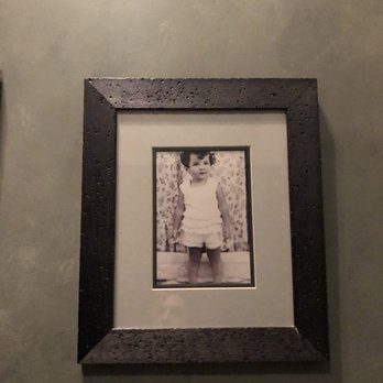 Natalia's - Little Natalia! All kinds of family photos all around restaurant - Italian Near Me - Macon, Georgia