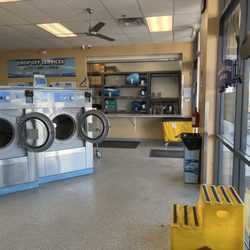 WaveMAX Laundry - Inside by front doors looking towards the service desk. They offer a full service laundry service with folding.