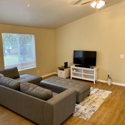 Grey sectional couch with ottoman