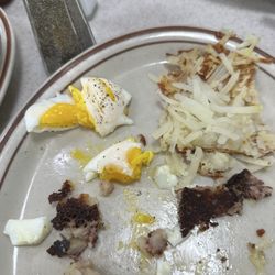 Leo's Coney Island - 2 breakfasts 36 bucks corned beef hash with poached eggs and hash browns. Clara is rude. Never again.
