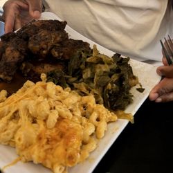 Jerk chicken with greens/cabbage and Mac/cheese