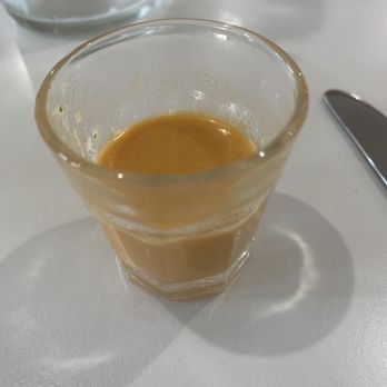 Aji Ceviche Bar - Shot glass of tiger sauce that come complimentary. Not spicy same sauce they use on fish - Peruvian Near Me - Orlando, Florida Aji Ceviche Bar - Shot glass of tiger sauce that come complimentary. Not spicy same sauce they use on fish - Peruvian Near Me - Orlando, Florida