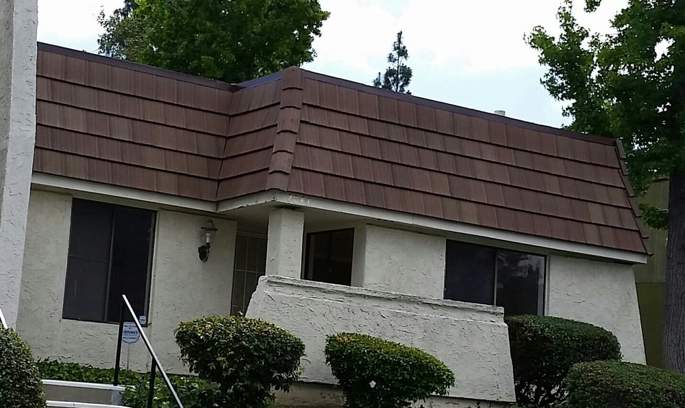 Slide of Novotny Roofing Inc