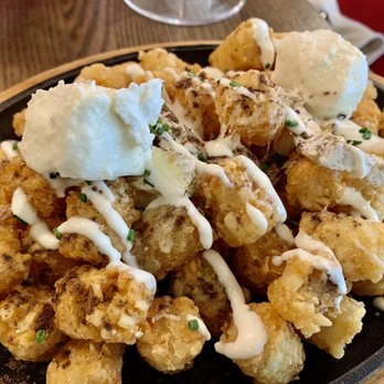 Tasting House - Boujee Tatar Tots (Le Gruyere, Creamy Boujee Dressing, Chives, Sheep & Goat Feta, Brie Cheese, Truffle Oil, $18)- 3/5 stars - Wine Bars Near Me - Los Gatos, California Tasting House - Boujee Tatar Tots (Le Gruyere, Creamy Boujee Dressing, Chives, Sheep & Goat Feta, Brie Cheese, Truffle Oil, $18)- 3/5 stars - Wine Bars Near Me - Los Gatos, California