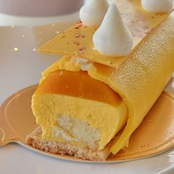 Bloom Cafe - Mmm Mmmango filling & light casing of sweet mango icing!