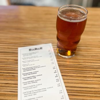 Radar Brewing Company - a glass of beer on a table - Breweries Near Me - Winston-Salem, North Carolina Radar Brewing Company - a glass of beer on a table - Breweries Near Me - Winston-Salem, North Carolina