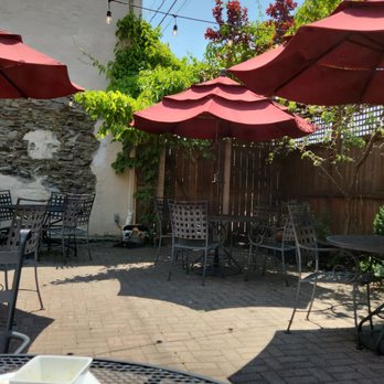 Caffe Tazza - a patio with tables and umbrellas - Wine Bars Near Me - Dansville, New York Caffe Tazza - a patio with tables and umbrellas - Wine Bars Near Me - Dansville, New York