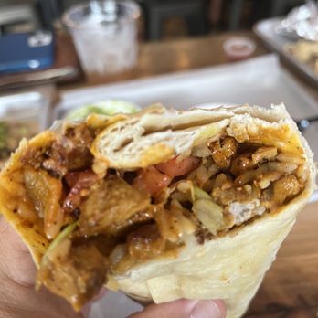 Cilantro's Taqueria - Al Pastor burrito a couple bites in - Tacos Near Me - Orlando, Florida Cilantro's Taqueria - Al Pastor burrito a couple bites in - Tacos Near Me - Orlando, Florida