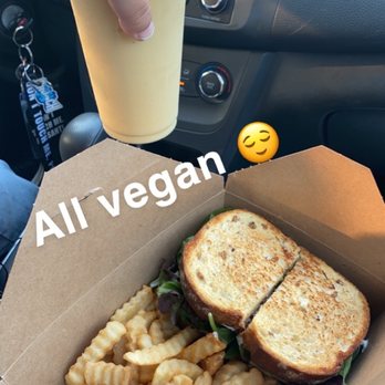 TNK Vegan Cafe - TNK Club Sandwich with fries Mango Smoothie - Vegan Near Me - Modesto, California TNK Vegan Cafe - TNK Club Sandwich with fries Mango Smoothie - Vegan Near Me - Modesto, California
