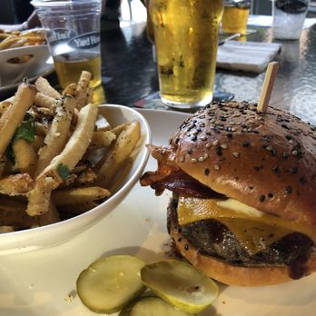 Yard House - BBQ Bacon Cheddar Burger with Parmesan Truffle fries - New American Near Me - Atlanta, Georgia Yard House - BBQ Bacon Cheddar Burger with Parmesan Truffle fries - New American Near Me - Atlanta, Georgia