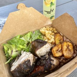 a box of food on a picnic table
