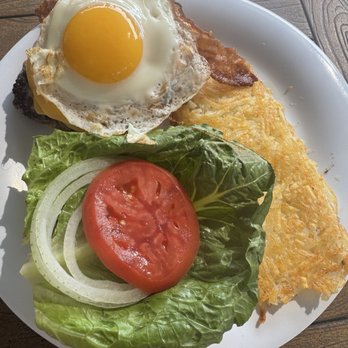 Anastasia Kitchen - The perfect egg yum it's got to be a ostrich honest there is a huge burger under there! - Diners Near Me - Saint Augustine, Florida