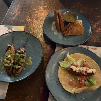 Cafe Tu Tu Tango - JERK CHICKEN SKEWERS BAJA FISH TACO (1) and CUBAN SLIDER (1) - Tapas/Small Plates Near Me - Orlando, Florida Cafe Tu Tu Tango - JERK CHICKEN SKEWERS BAJA FISH TACO (1) and CUBAN SLIDER (1) - Tapas/Small Plates Near Me - Orlando, Florida