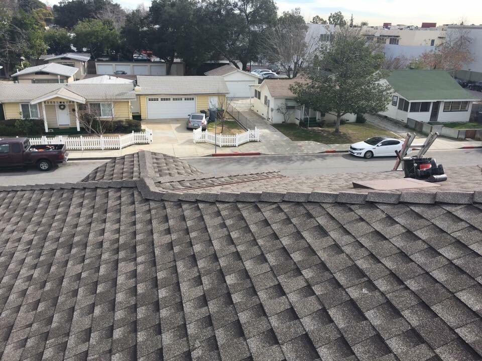 Slide of Tony and Velasco Roofing Constructions