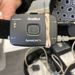 Rem Diagnostic - Equipment held together by rubber bands.