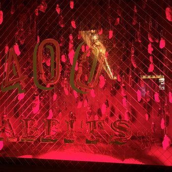 Las Perlas - a window display with neon lights - Lounges Near Me - Los Angeles, California