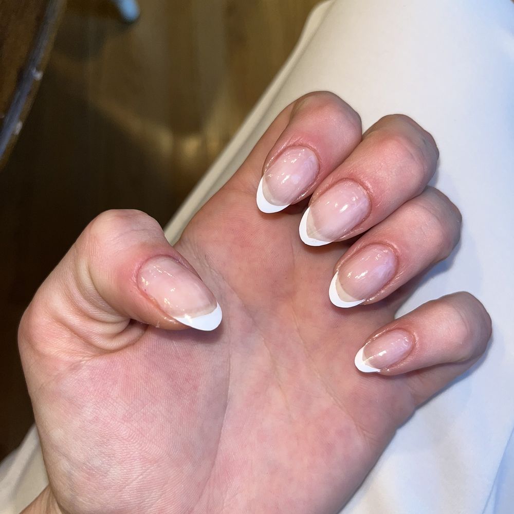 comically bad "french manicure". comically bad "french manicure".
