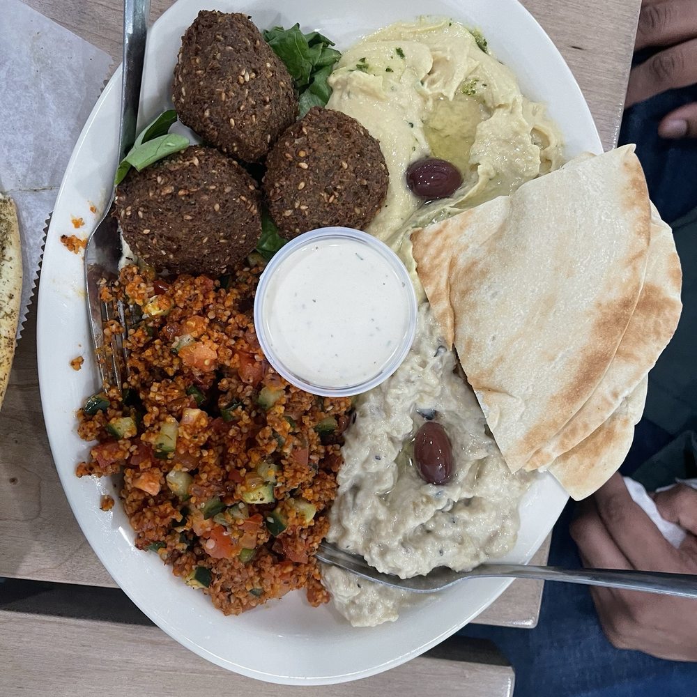 Falafel Pita, jalapeno humus, babaganoush, turkish kisir Falafel Pita, jalapeno humus, babaganoush, turkish kisir